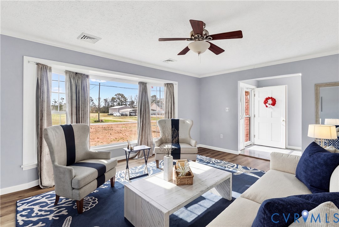 9829 Line Fence Road Hayes, VA 23072 - Photo 3 of 64 a living room with furniture and a large window