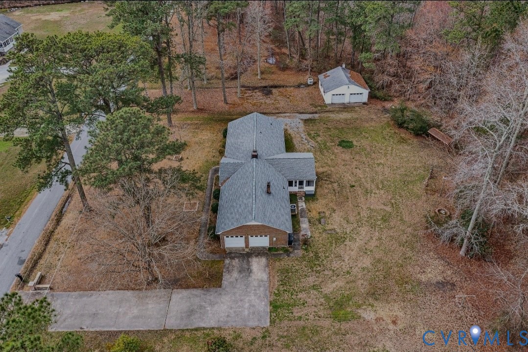 9829 Line Fence Road Hayes, VA 23072 - Photo 42 of 64 a aerial view of a house with outdoor space