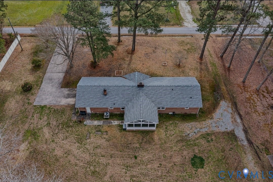 9829 Line Fence Road Hayes, VA 23072 - Photo 44 of 64 an aerial view of a house with a yard
