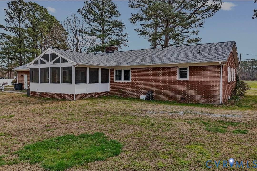 9829 Line Fence Road Hayes, VA 23072 - Photo 51 of 64 a house with trees in the background