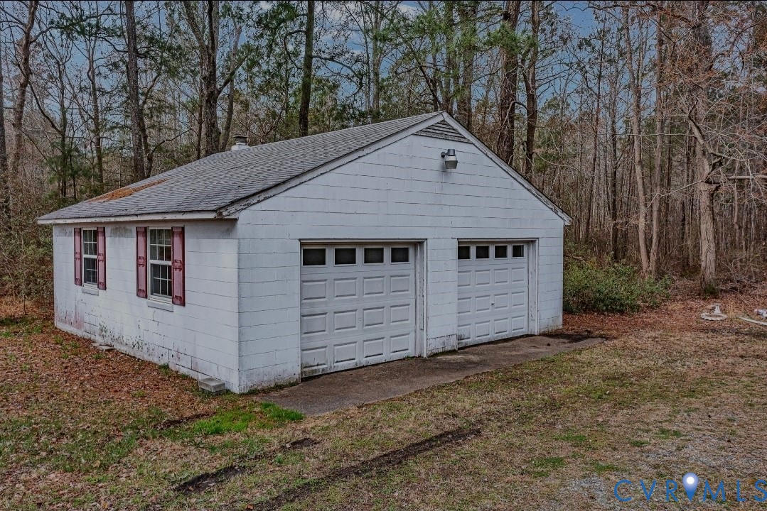 9829 Line Fence Road Hayes, VA 23072 - Photo 52 of 64 a view of a house with a yard