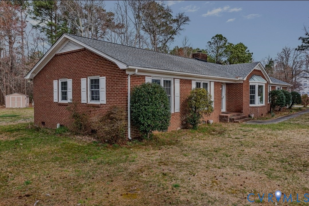 9829 Line Fence Road Hayes, VA 23072 - Photo 56 of 64 front view of house with a yard