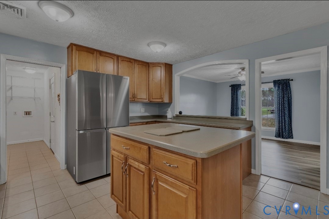 9829 Line Fence Road Hayes, VA 23072 - Photo 8 of 64 a kitchen with stainless steel appliances granite countertop a refrigerator and a stove