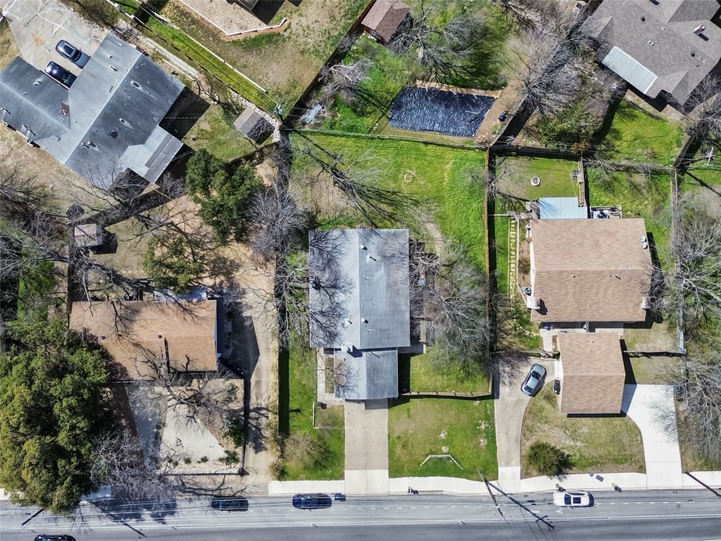 2800 Burleson Road Austin, TX 78741 - Photo 4 of 35 an aerial view of multiple houses with outdoor space