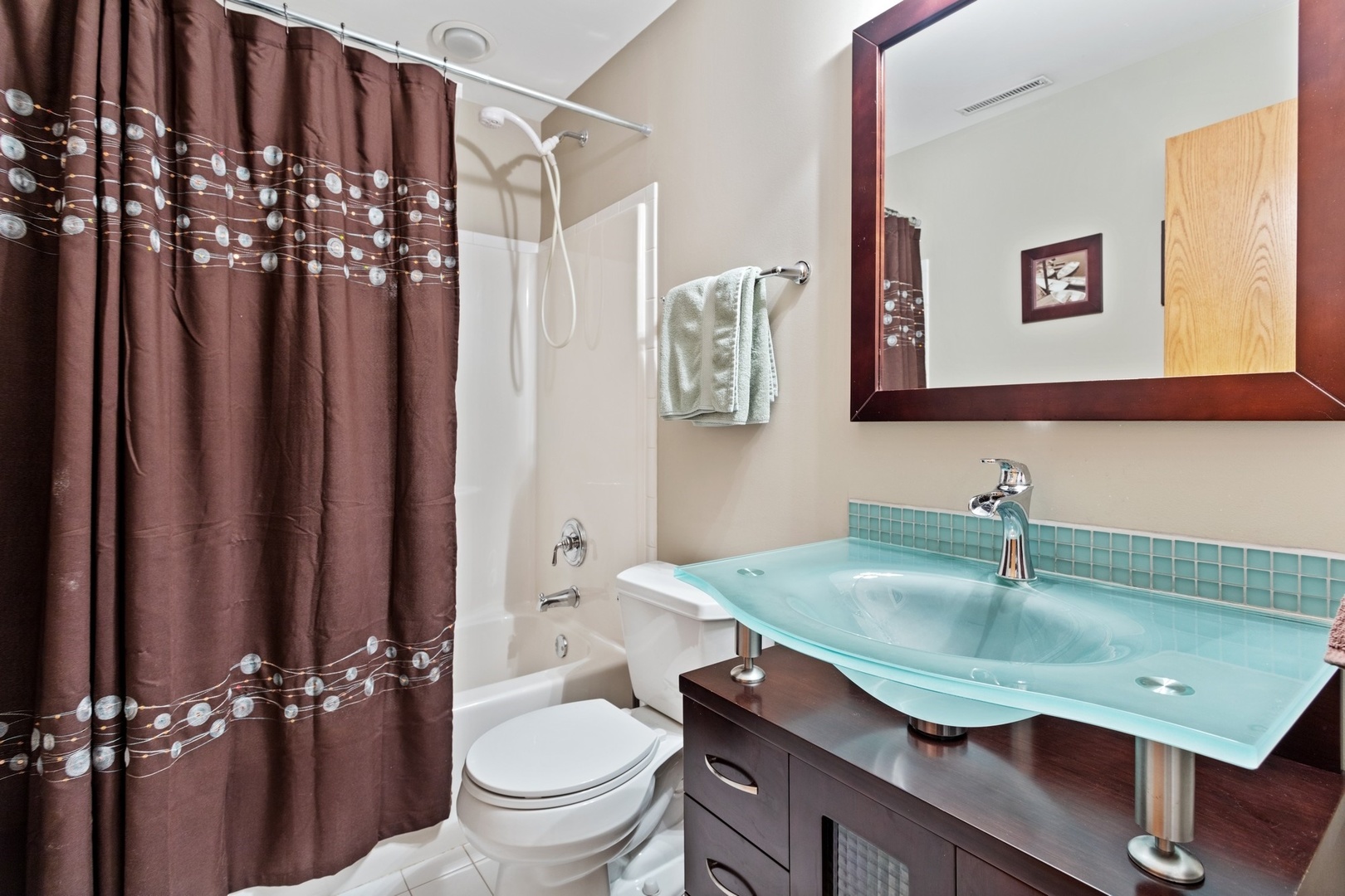 2955 North Racine Avenue, Unit 1A Chicago, IL 60657 - Photo 20 of 29 a bathroom with a sink a toilet and shower
