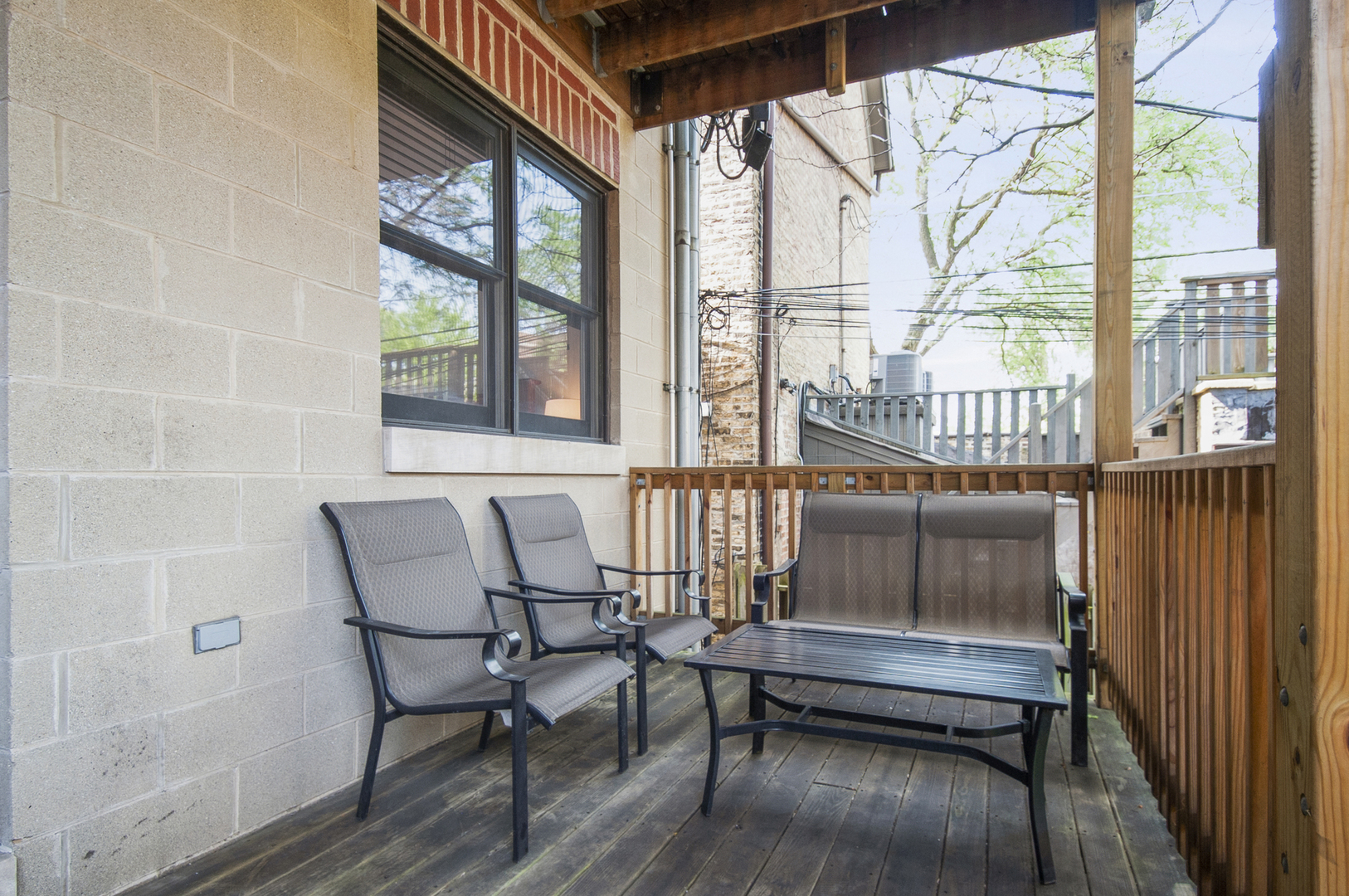 2955 North Racine Avenue, Unit 1A Chicago, IL 60657 - Photo 25 of 29 a roof deck with a table and chairs