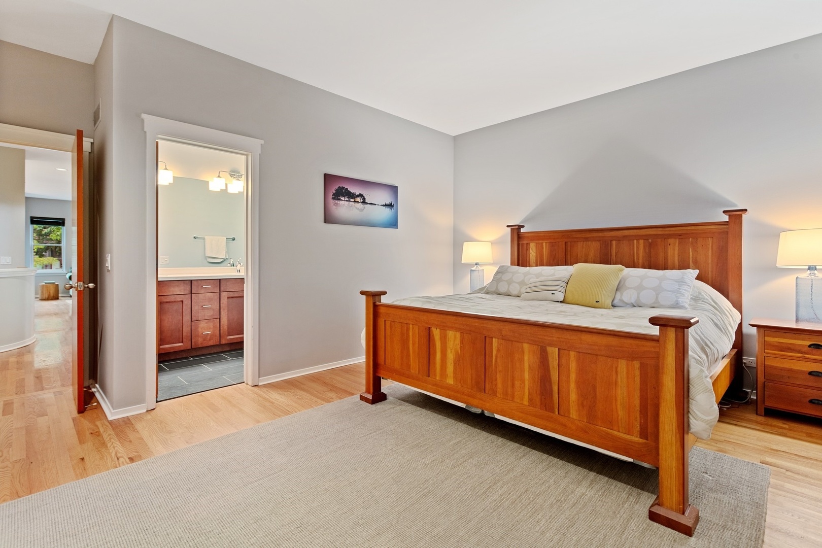 2955 North Racine Avenue, Unit 1A Chicago, IL 60657 - Photo 10 of 29 a bedroom with a bed and a cabinets