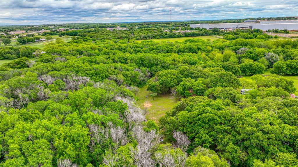 1201 South Briaroaks Road Burleson, TX 76028 - Photo 16 of 40 a view of a lush green field