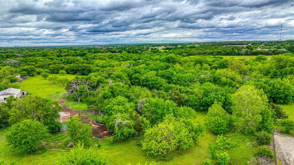 1201 South Briaroaks Road Burleson, TX 76028 - Photo 19 of 40 a view of a yard with an outdoor space