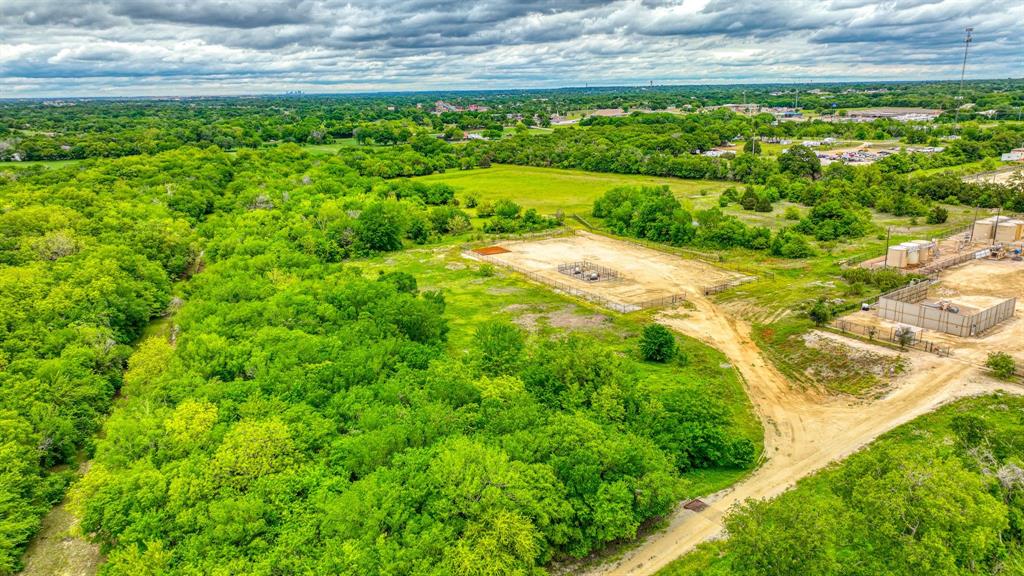 1201 South Briaroaks Road Burleson, TX 76028 - Photo 20 of 40 a view of a yard with an outdoor space