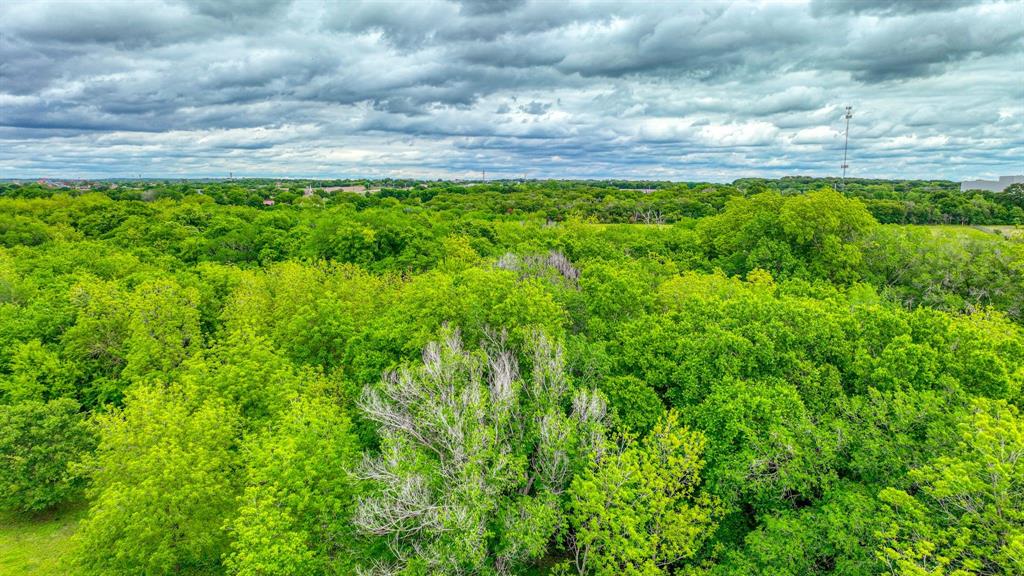 1201 South Briaroaks Road Burleson, TX 76028 - Photo 31 of 40 a view of a yard with an outdoor space