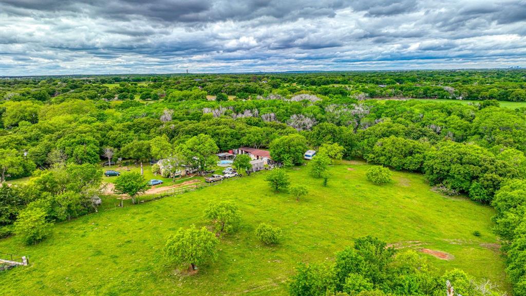 1201 South Briaroaks Road Burleson, TX 76028 - Photo 33 of 40 a view of a garden with an outdoor space