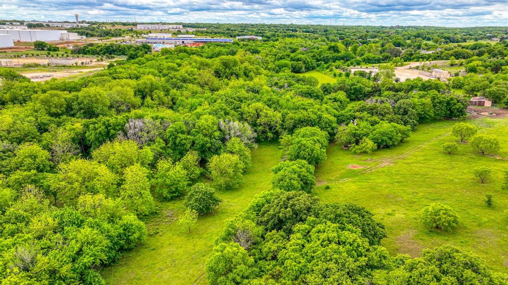 1201 South Briaroaks Road Burleson, TX 76028 - Photo 34 of 40 a view of a yard with an outdoor space