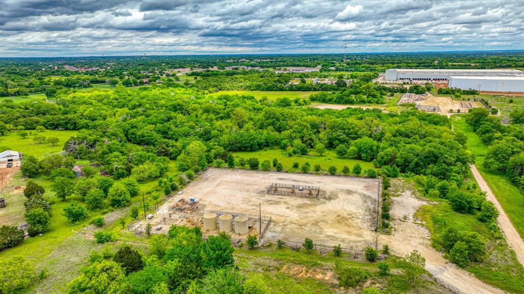 1201 South Briaroaks Road Burleson, TX 76028 - Photo 38 of 40 a view of a garden with an outdoor space
