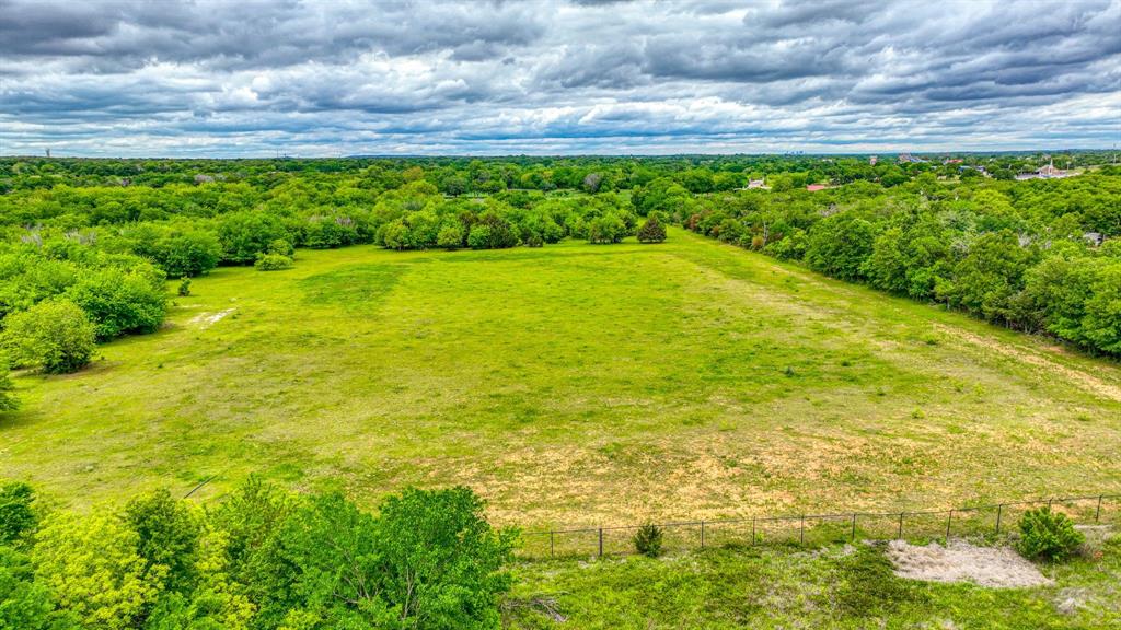 1201 South Briaroaks Road Burleson, TX 76028 - Photo 39 of 40 a view of a yard with an outdoor seating