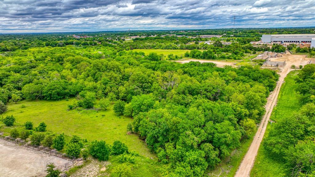 1201 South Briaroaks Road Burleson, TX 76028 - Photo 40 of 40 a view of a yard with an outdoor space