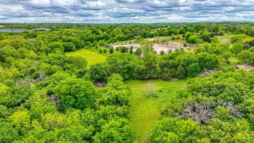 1201 South Briaroaks Road Burleson, TX 76028 - Photo 10 of 40 a view of a garden