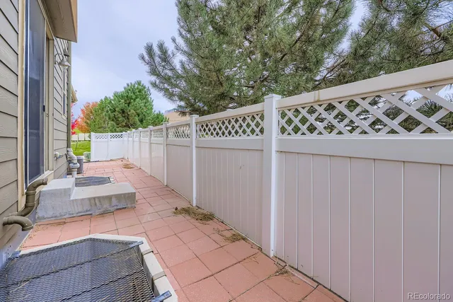 a view of a wrought iron fences in front of house