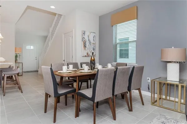 a view of a dining room with furniture