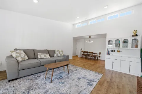 a living room with furniture and a table
