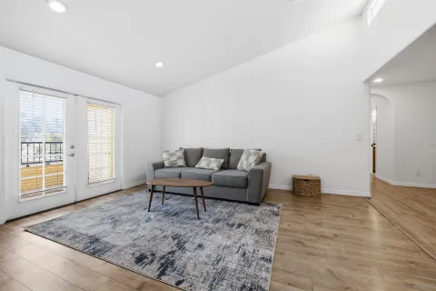a living room with furniture and a couch