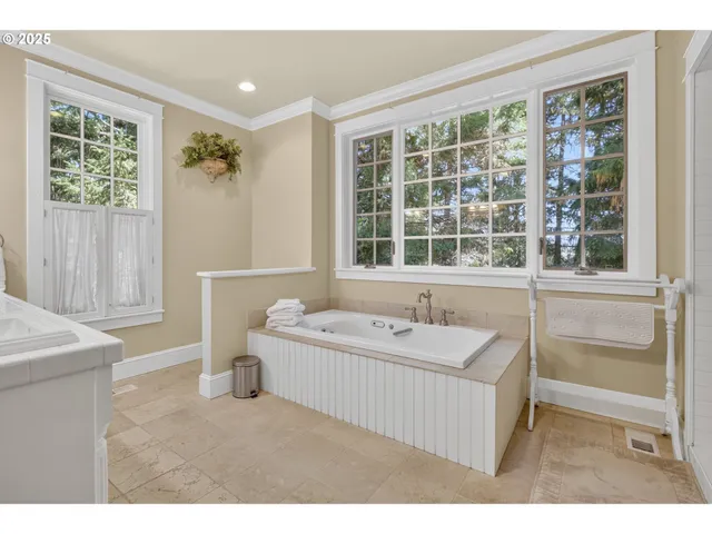 a bathroom with a sink and a bathtub