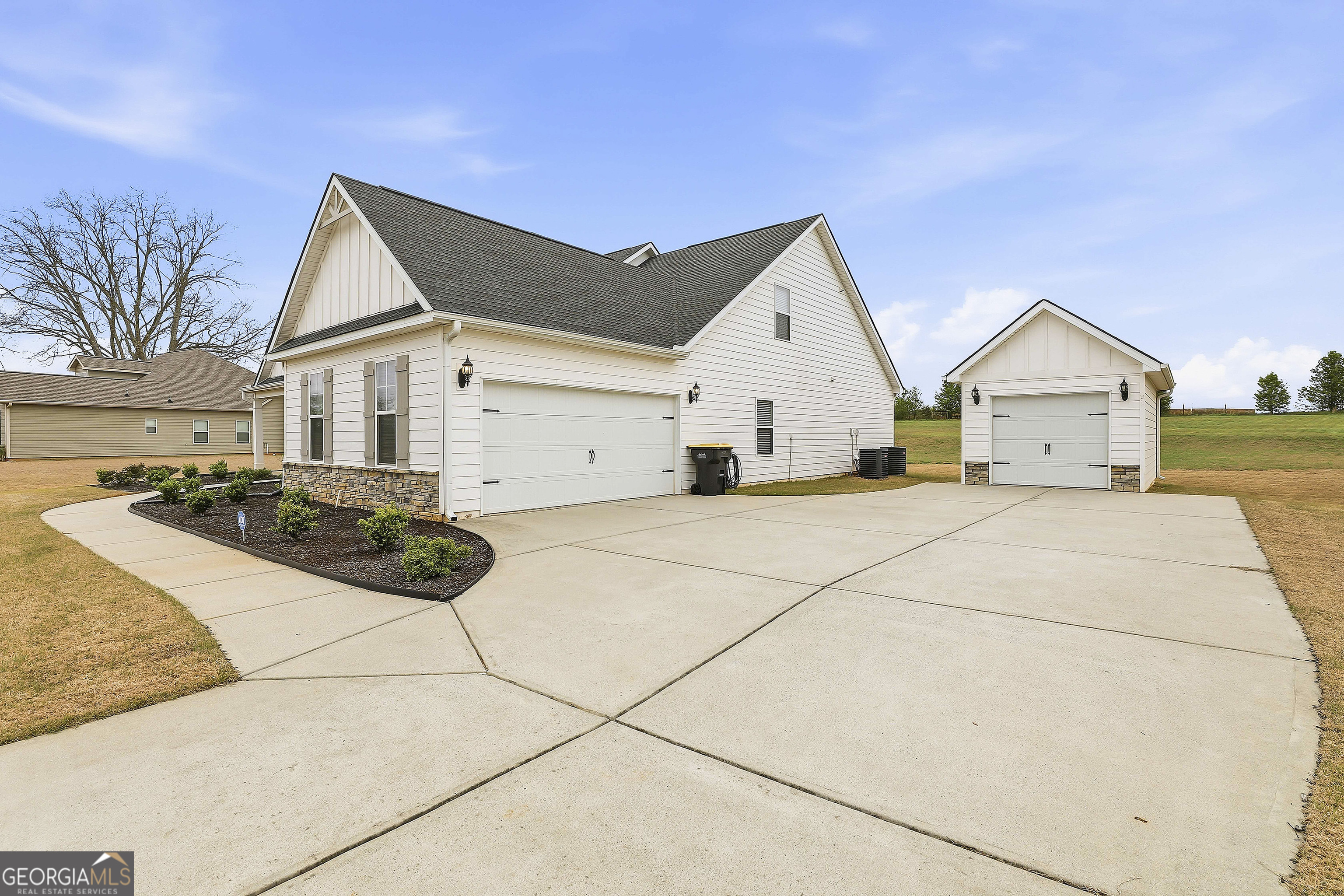 66 Chapman Farm Road Senoia, GA 30276 - Photo 2 of 46 a view of a back yard of the house