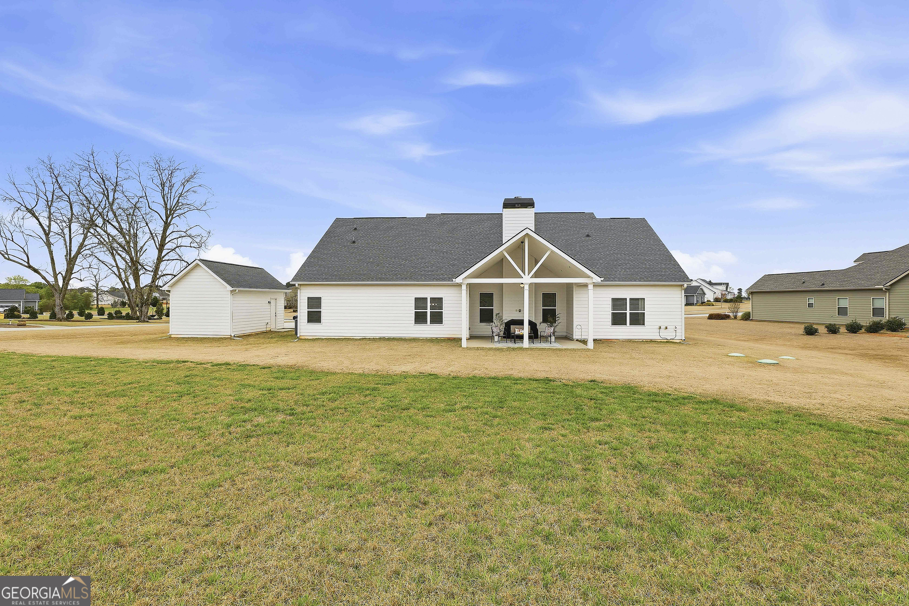66 Chapman Farm Road Senoia, GA 30276 - Photo 41 of 46 a view of house with outdoor space and sitting area