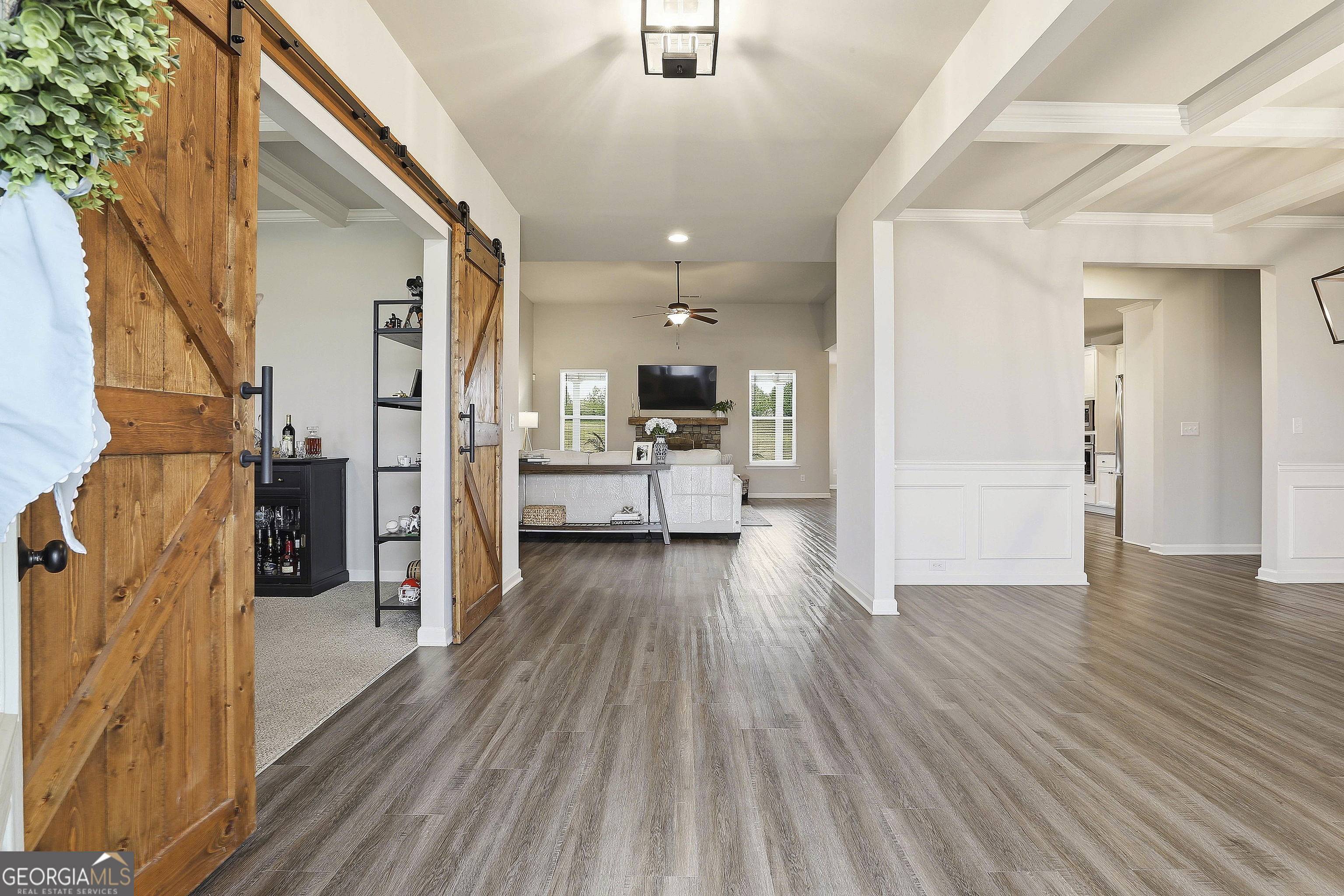 66 Chapman Farm Road Senoia, GA 30276 - Photo 5 of 46 a view of a living room with a wooden floor
