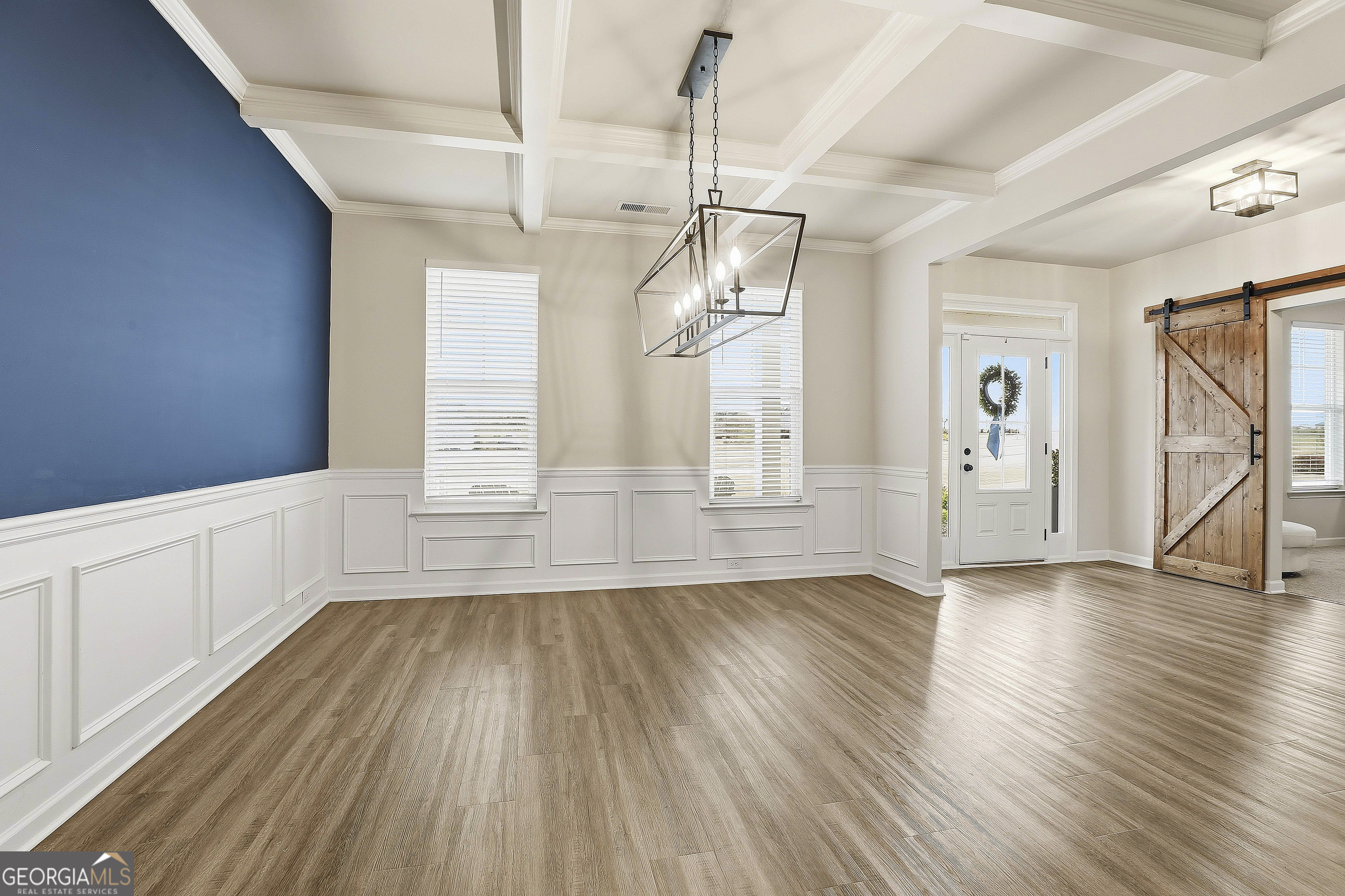 66 Chapman Farm Road Senoia, GA 30276 - Photo 8 of 46 a view of empty room with wooden floor and fan