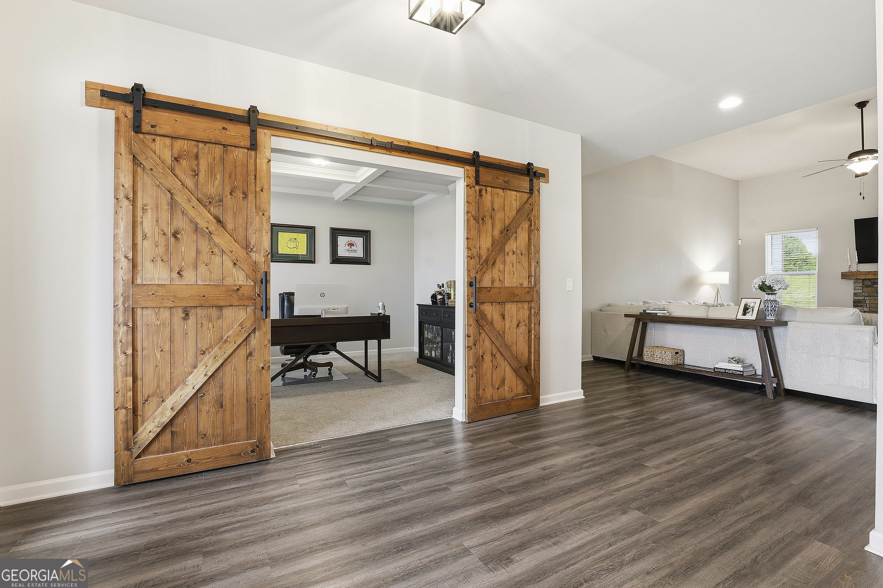 66 Chapman Farm Road Senoia, GA 30276 - Photo 10 of 46 a view of a livingroom with furniture and hardwood floor