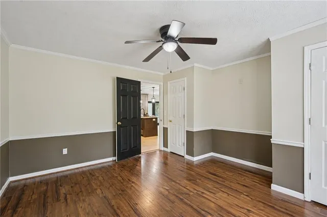 a bathroom with a shower and mirror
