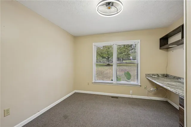 a bathroom with a double vanity sink and mirror