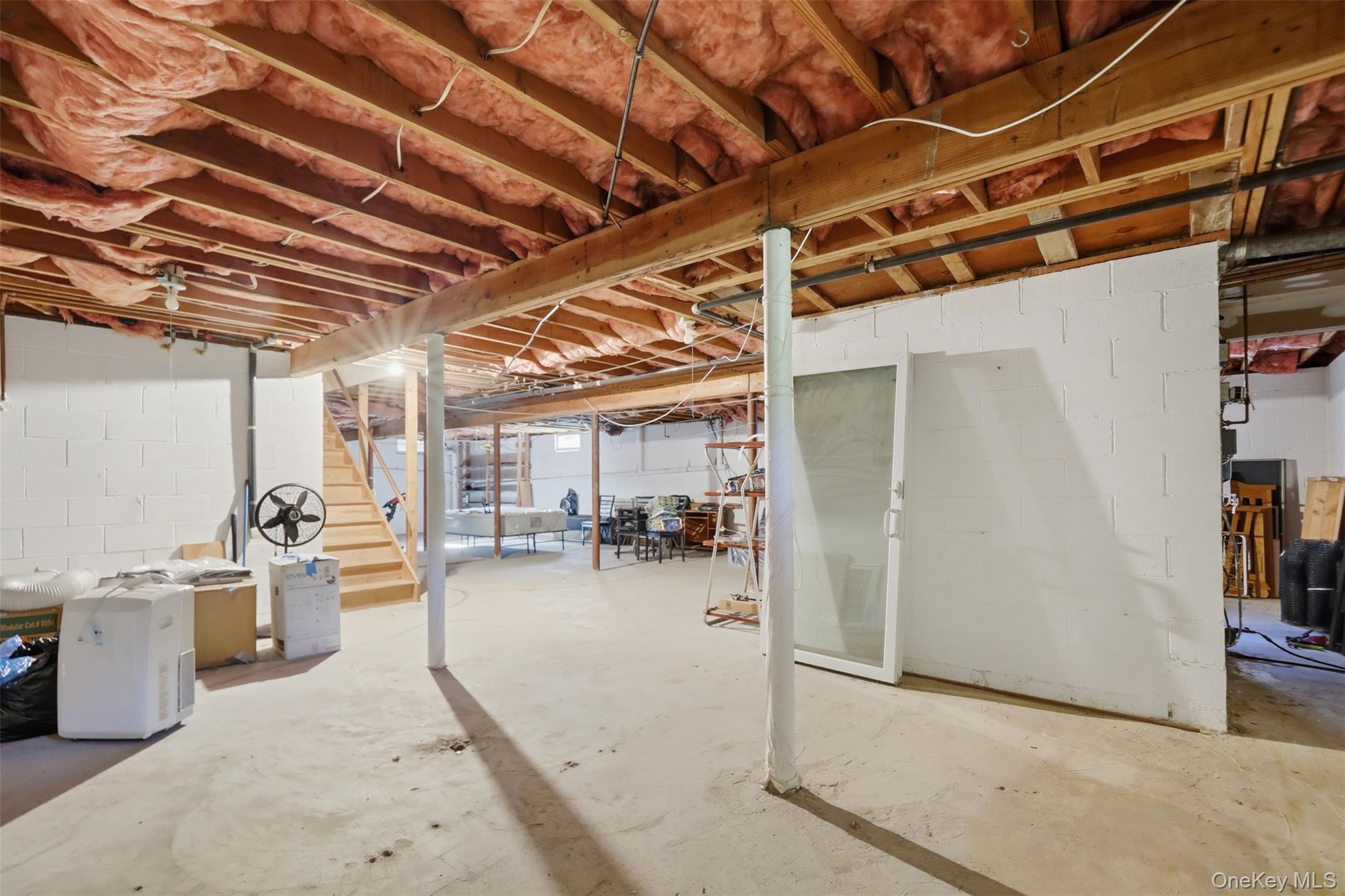 985 Craigville Road Chester, NY 10918 - Photo 28 of 36 Unfinished basement with exposed ceiling joists and insulation
