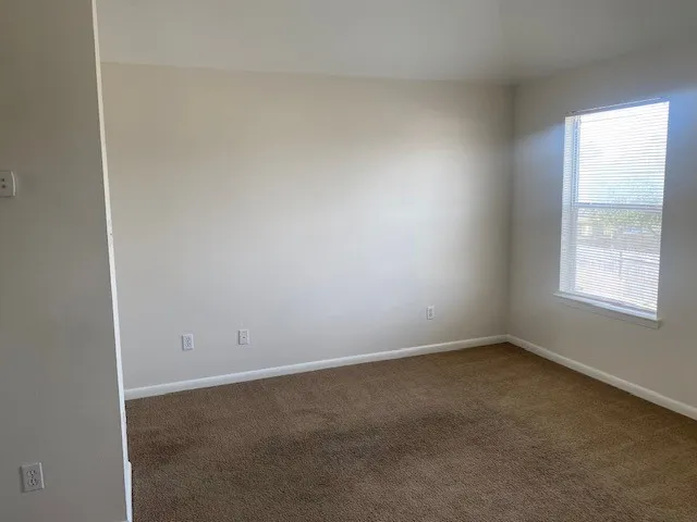 an empty room with a window