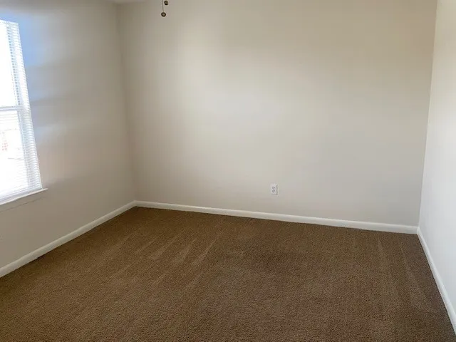 an empty room with a window