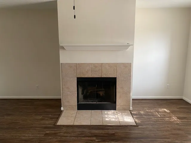 a living room with a fireplace
