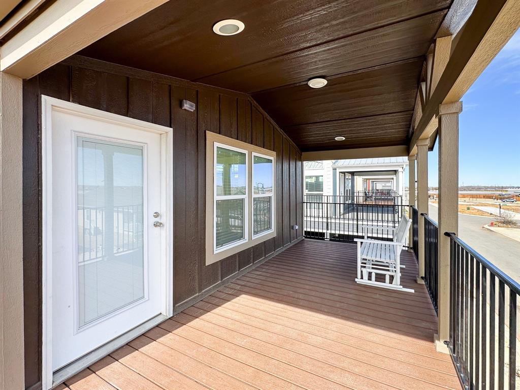 153 Cabrera Street Oak Point, TX 75068 - Photo 12 of 22 Covered outdoor porch featuring wood-finish decking