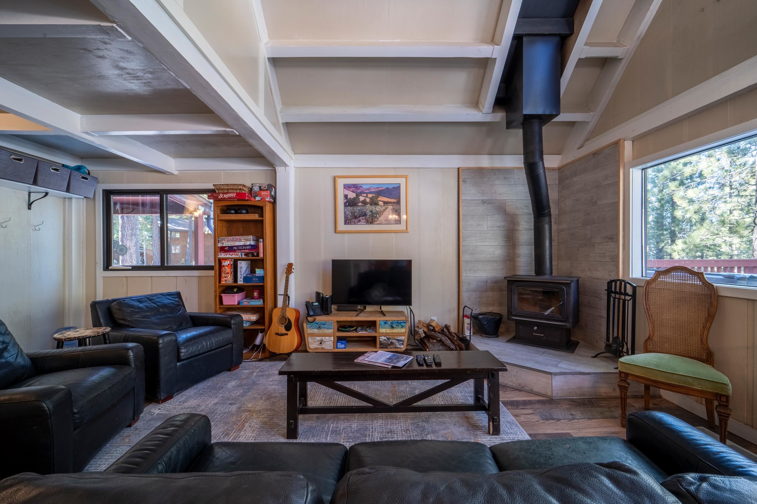 842 Beaver Pond Truckee, CA 96161 - Photo 11 of 22 a living room with furniture and a flat screen tv