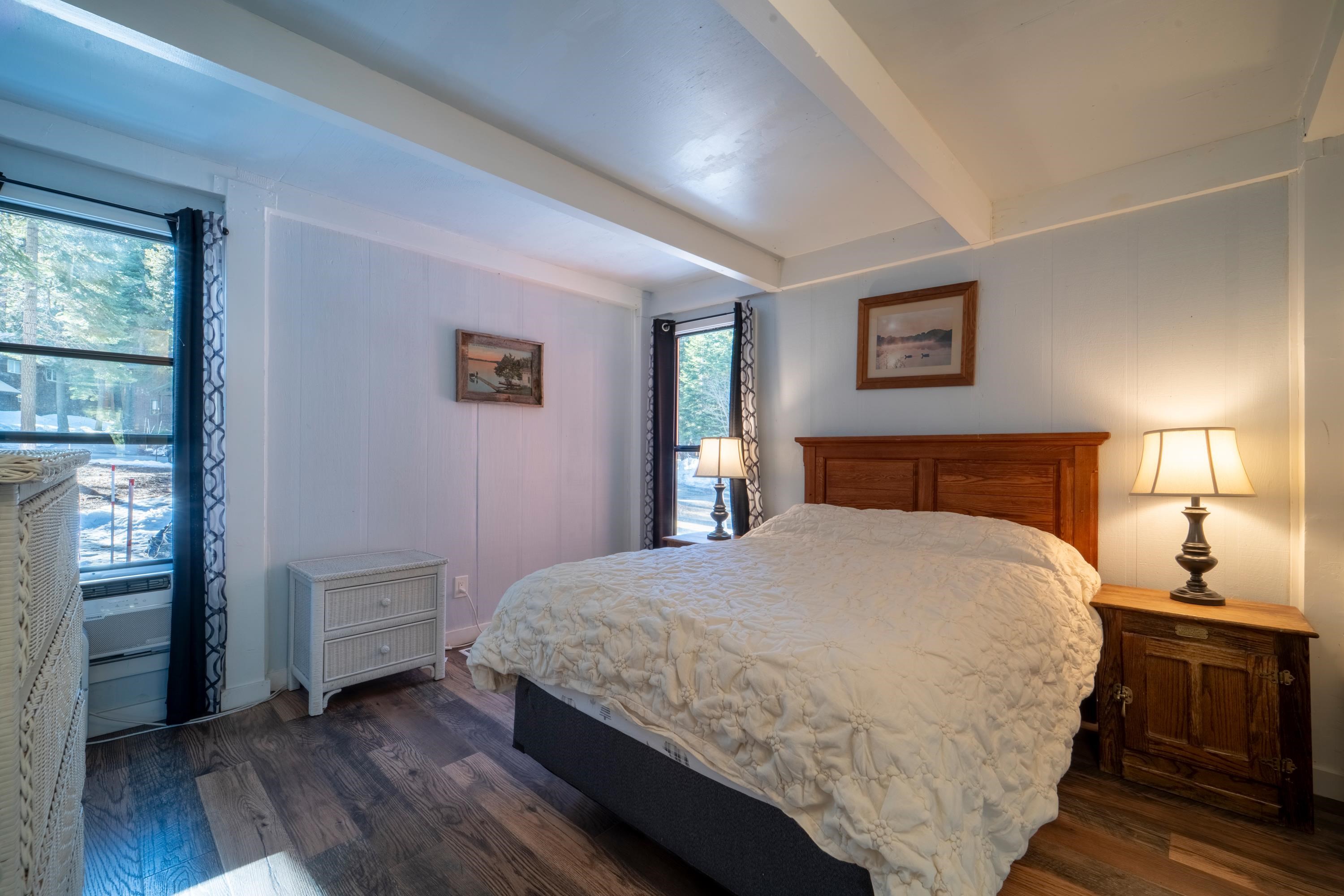 842 Beaver Pond Truckee, CA 96161 - Photo 15 of 22 a bedroom with a bed and a window