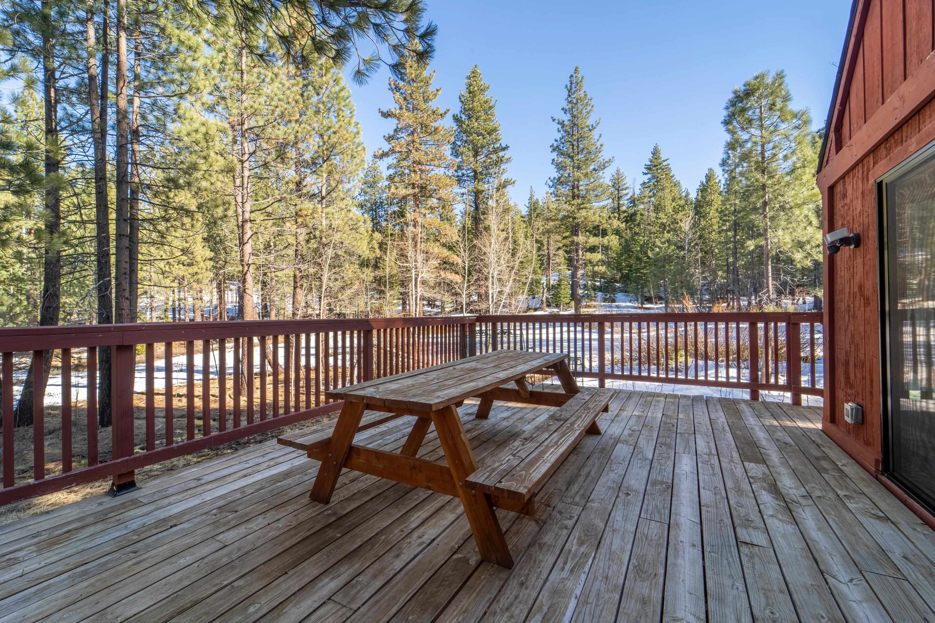 842 Beaver Pond Truckee, CA 96161 - Photo 22 of 22 a view of a wooden deck with furniture
