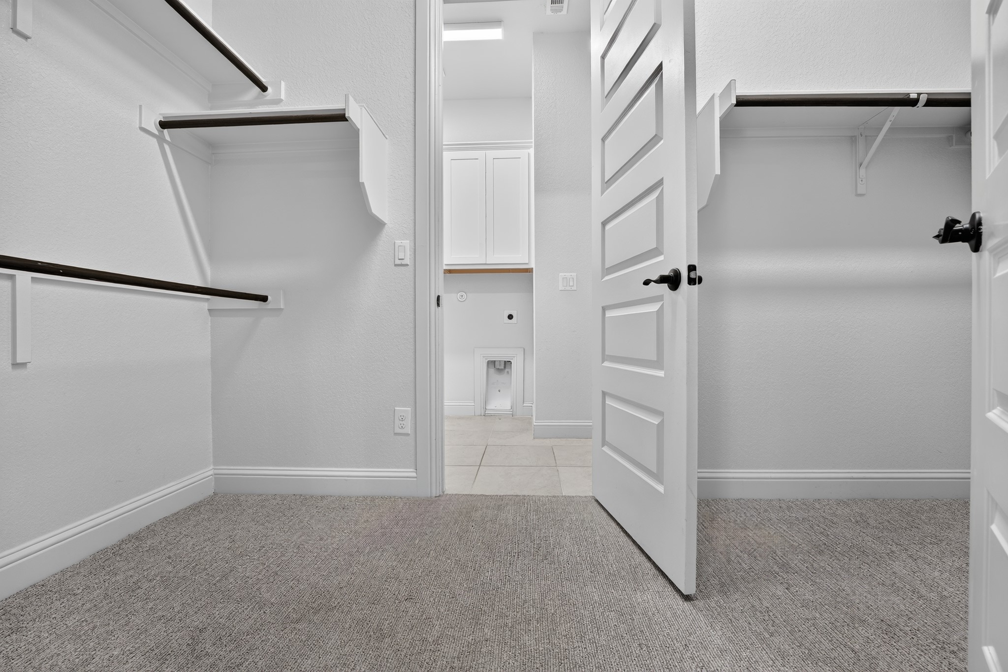 508 Pinnacle View Drive Georgetown, TX 78628 - Photo 21 of 27 Functional wardrobe space adjoins a practical laundry area.