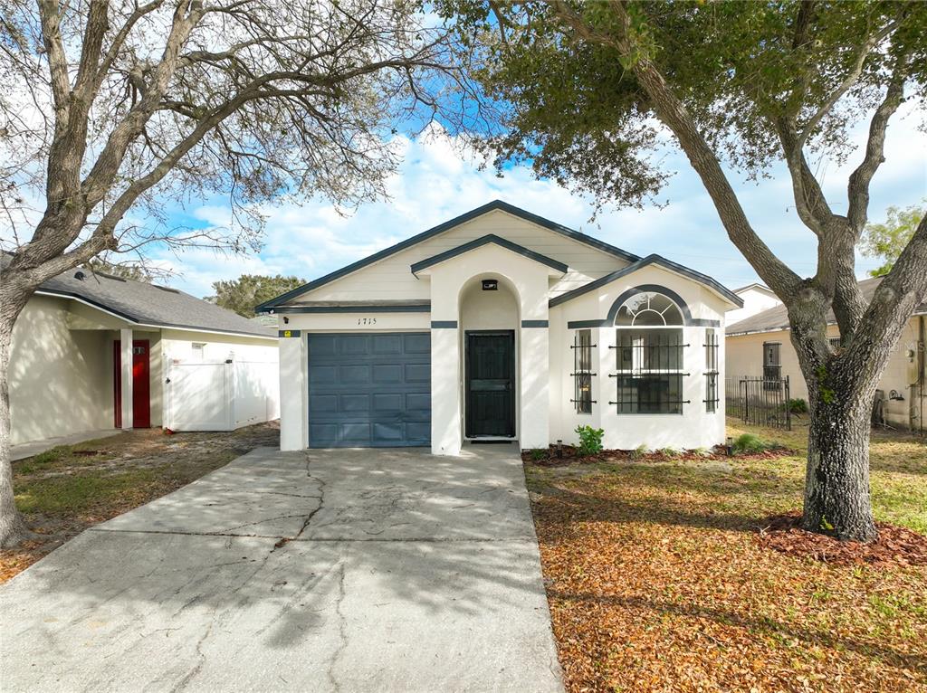 1715 Pointe Ridge Court Orlando, FL 32808 - Photo 2 of 51