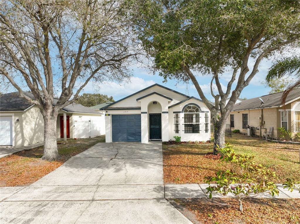 1715 Pointe Ridge Court Orlando, FL 32808 - Photo 3 of 51