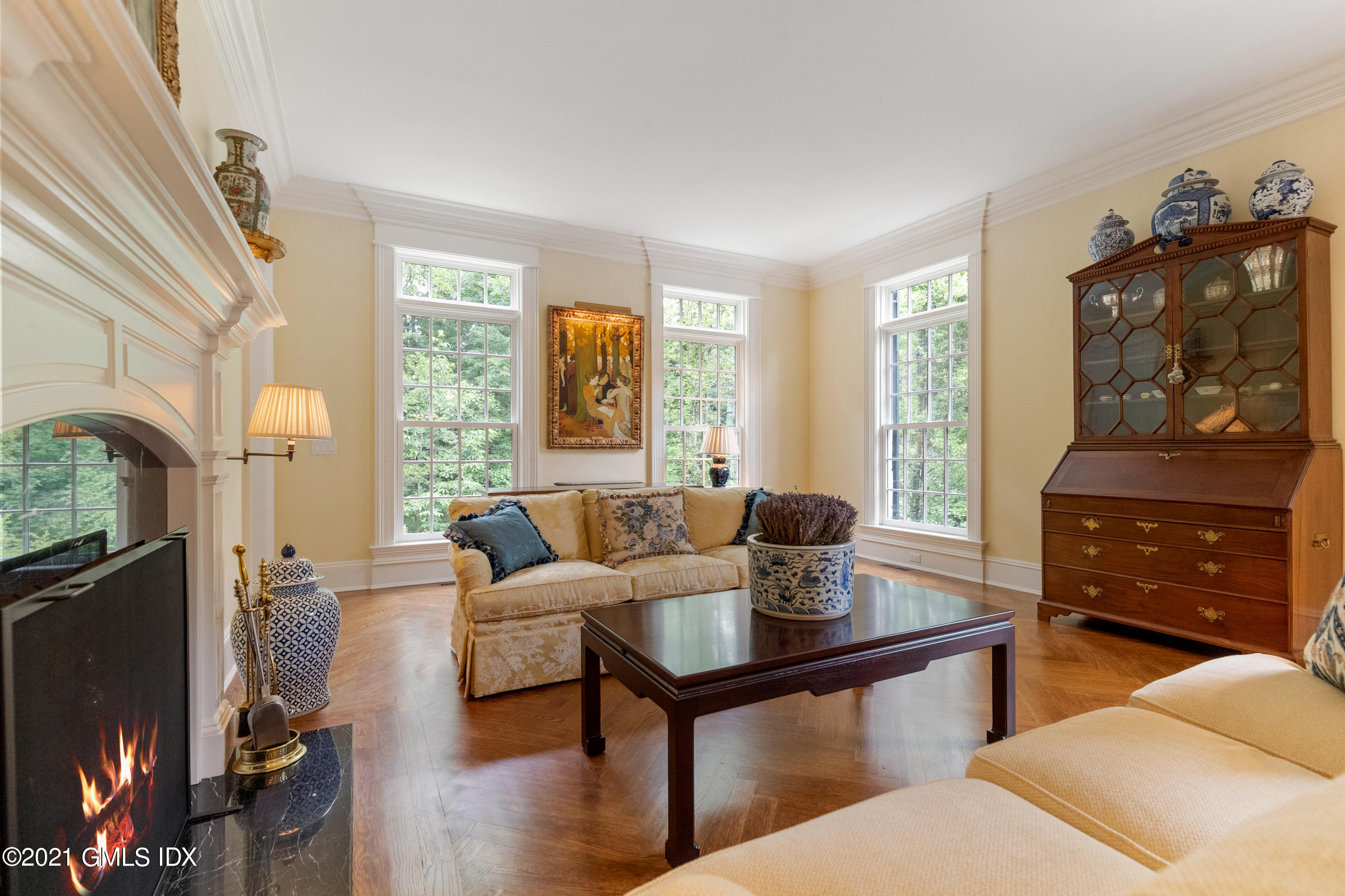 55 Perkins Road Greenwich, CT 06830 - Photo 9 of 38 a living room with furniture and a window