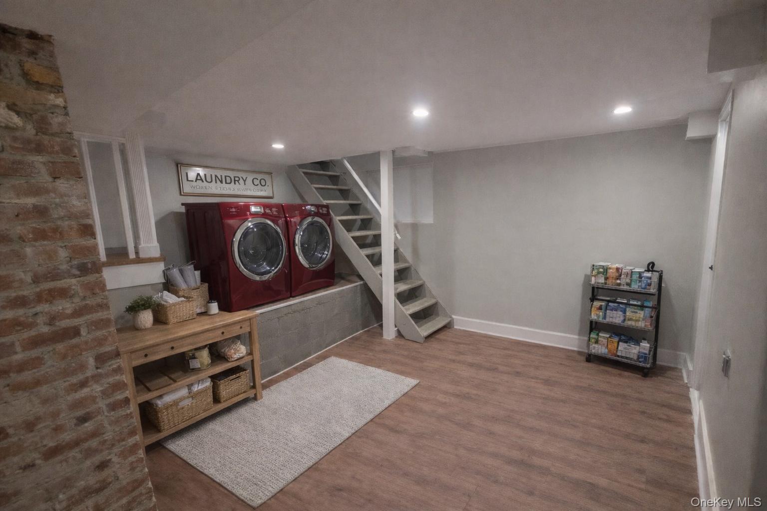 263 South Mountain Road New City, NY 10956 - Photo 11 of 13 laundry room staged with shelving and rug