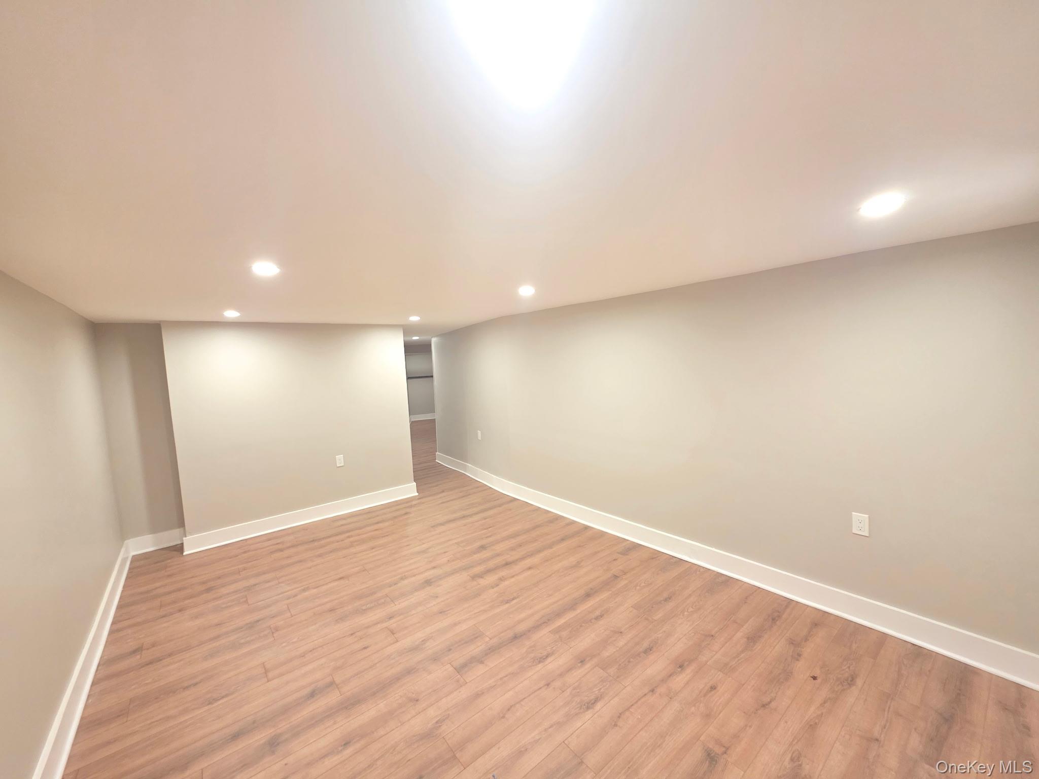 263 South Mountain Road New City, NY 10956 - Photo 28 of 33 Finished basement with recessed lighting and light wood finished floors
