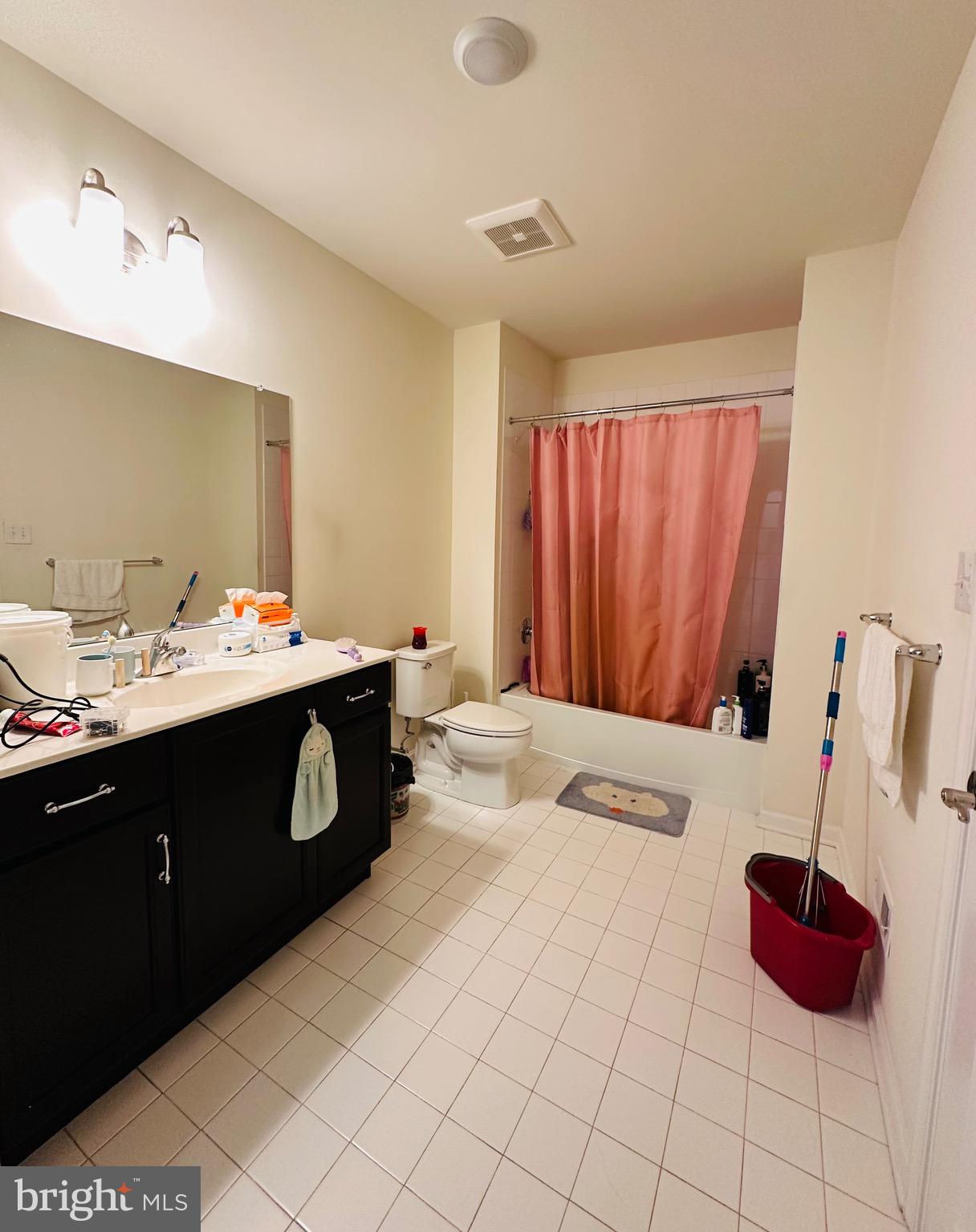 3408 Pietro Way Philadelphia, PA 19145 - Photo 13 of 21 a bathroom with a sink vanity and mirror
