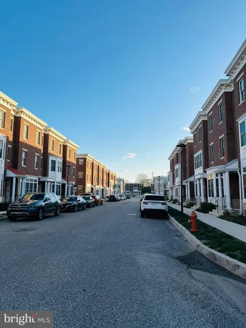 a view of a street with cars