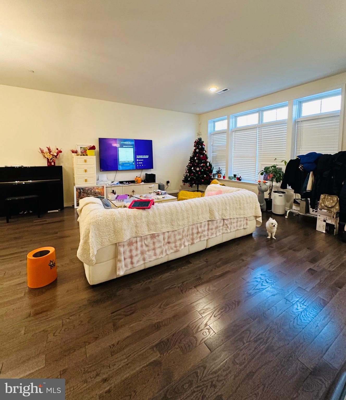 3408 Pietro Way Philadelphia, PA 19145 - Photo 5 of 21 a bedroom with bed and a couch